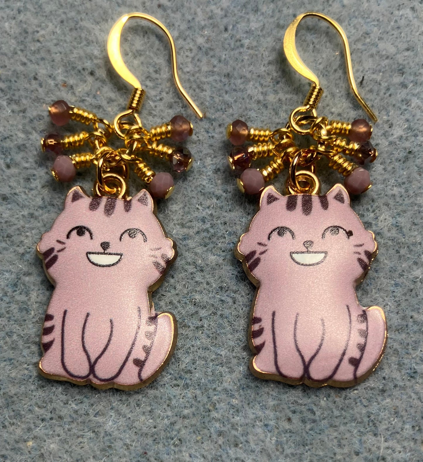 Lavender enamel cat charm earrings adorned with tiny dangling lavender Chinese crystal beads.