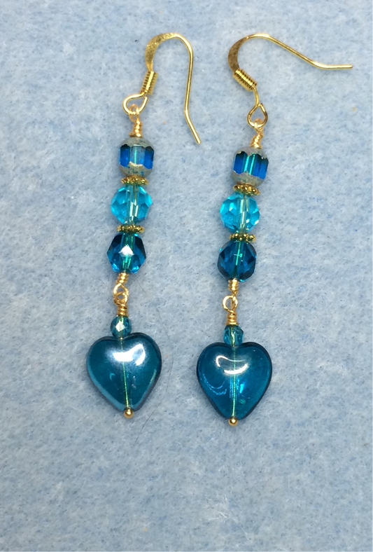 Small turquoise Czech glass heart bead earrings adorned with turquoise Czech glass beads.