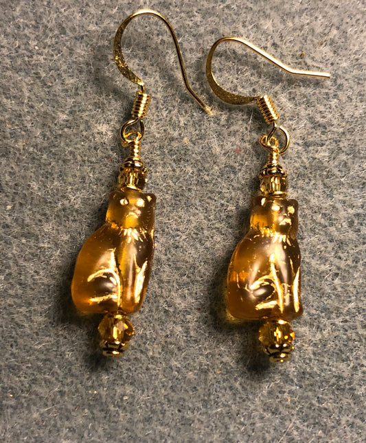 Small translucent amber and gold Czech glass cat bead earrings adorned with amber Chinese crystal beads.