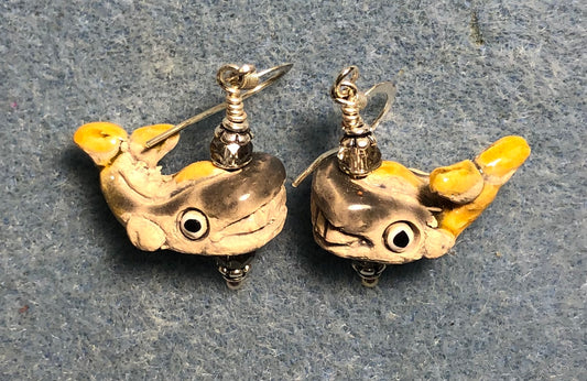 Small gray and yellow ceramic whale bead earrings adorned with gray Chinese crystal beads.