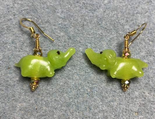 Small lime green lamp work elephant bead earrings adorned with sparkly lime green Chinese crystal beads.