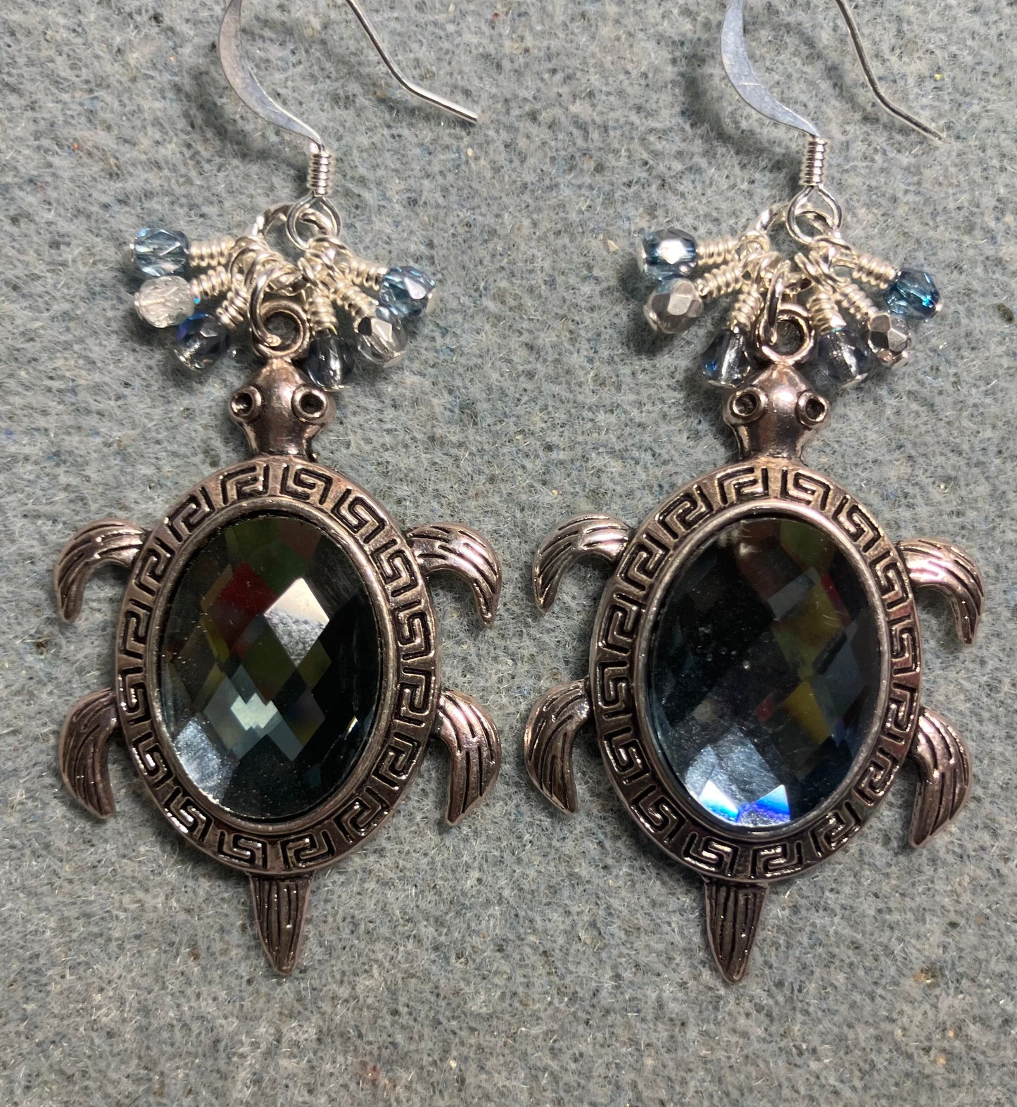 Large silver and Montana blue rhinestone turtle charm earrings adorned with small dangling Montana blue and silver Czech glass beads.