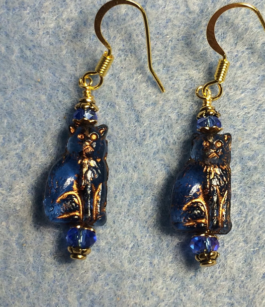 Small dark blue (with copper inlay) Czech glass cat bead earrings adorned with dark blue Chinese crystal beads.