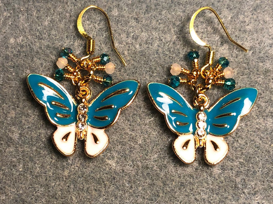 Turquoise and white enamel and rhinestone butterfly charm earrings adorned with tiny dangling turquoise and white Chinese crystal beads.