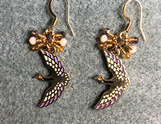Gold, off white, and purple enamel flying crane charm earrings adorned with tiny amber, off white, and purple Chinese crystal beads.