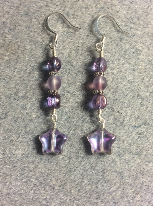 Small metallic violet Czech glass star bead earrings adorned with light violet Czech glass beads.