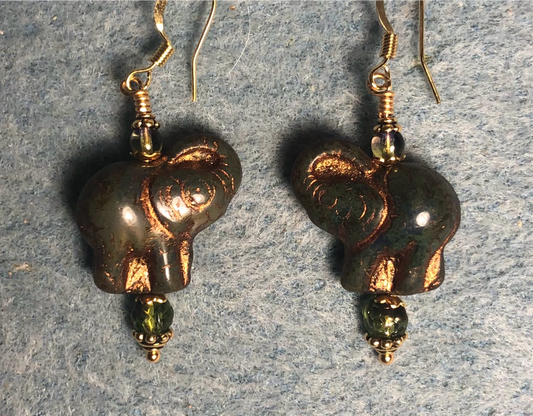 Opaque dark green (with gold inlay) Czech glass elephant bead earrings adorned with dark green Czech glass beads.