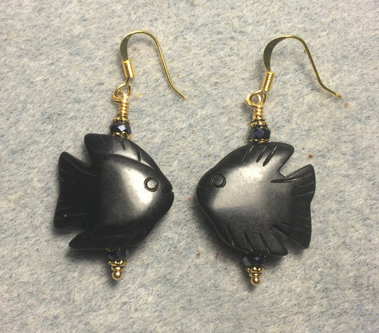 Carved black gemstone angelfish bead earrings adorned with black Chinese crystal beads.