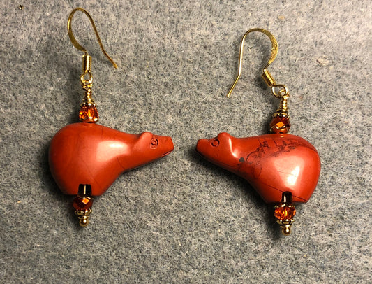 Reddish orange poppy jasper gemstone bear bead earrings adorned with orange Chinese crystal beads.
