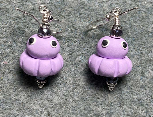 Violet polymer clay octopus bead earrings adorned with purple Chinese crystal beads.