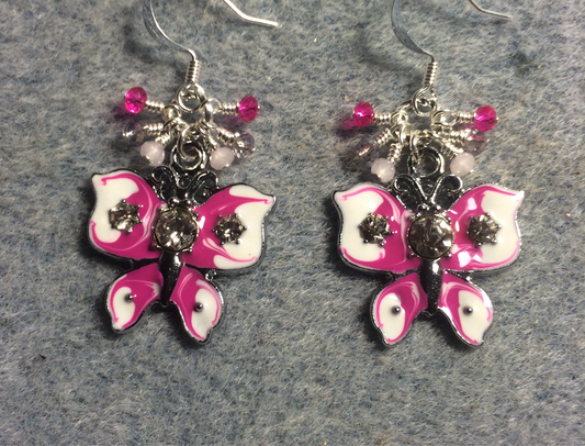 Vintage hot pink and white enamel and rhinestone butterfly charm earrings adorned with tiny dangling hot pink and light pink Chinese crystal beads.