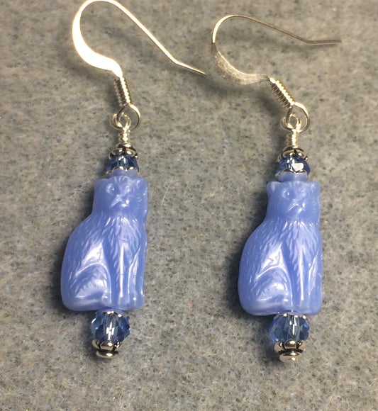 Small opaque light blue Czech glass cat bead earrings adorned with light blue Chinese crystal beads.