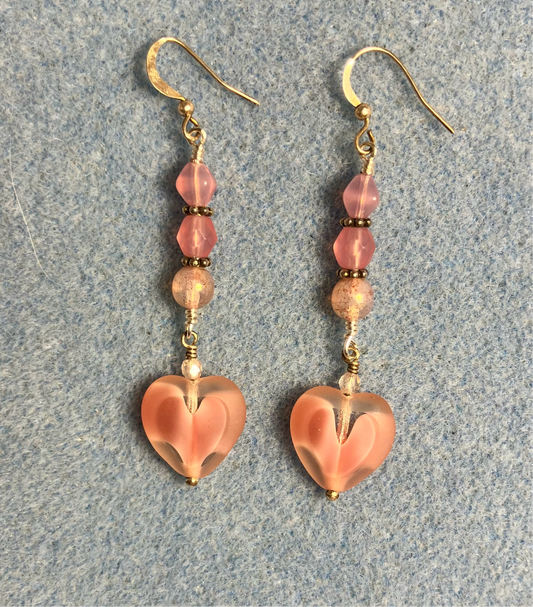 Pink Czech glass heart bead earrings adorned with pink Czech glass beads.