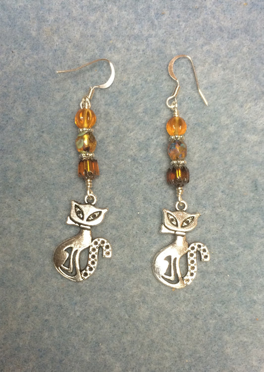 Large silver cat charm earrings adorned with amber Czech glass beads