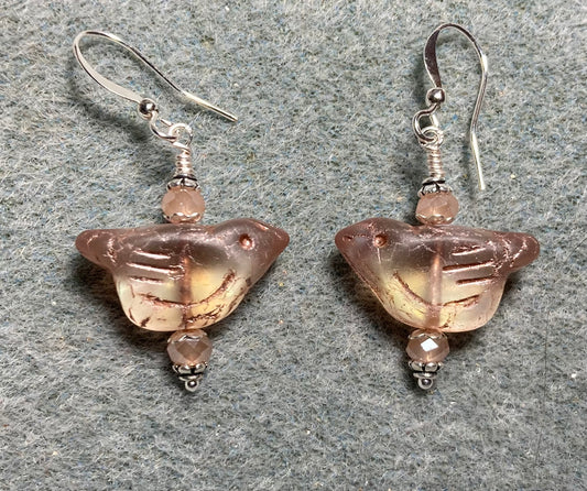 Translucent rose (with copper wash) Czech glass bird bead earrings adorned with peach Chinese crystal beads.