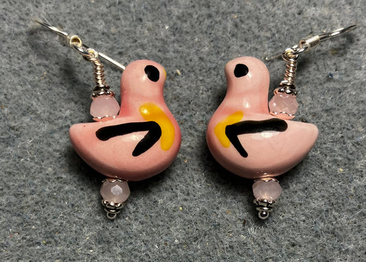 Pink, black, and yellow ceramic duck bead earrings adorned with pink Chinese crystal beads.