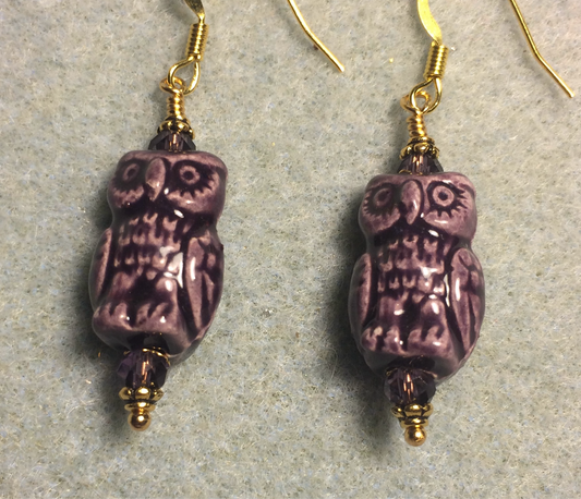 Purple ceramic owl bead earrings adorned with purple Chinese crystal beads.