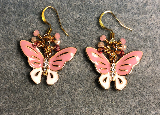 Pink and white enamel and rhinestone butterfly charm earrings adorned with tiny dangling light pink and rose pink Chinese crystal beads.