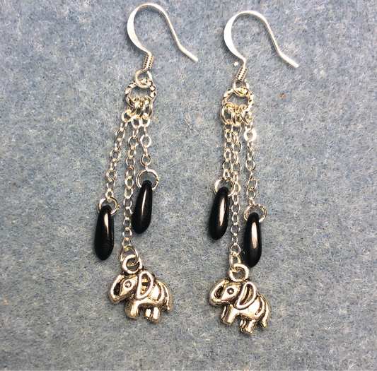 Small silver elephant charm earrings attached to silver chain and adorned with small black Czech glass dagger beads