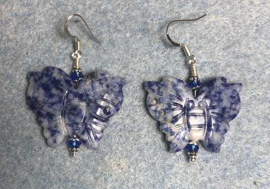 Large blue sodalite gemstone butterfly bead earrings adorned with blue Chinese crystal beads.