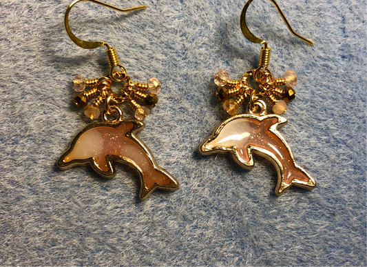Peach and gold resin dolphin charm earrings adorned with tiny dangling peach and gold Chinese crystal beads.