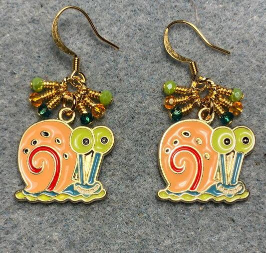 Orange, green, and turquoise enamel snail charm earrings adorned with tiny dangling orange, green, and turquoise Chinese crystal beads.