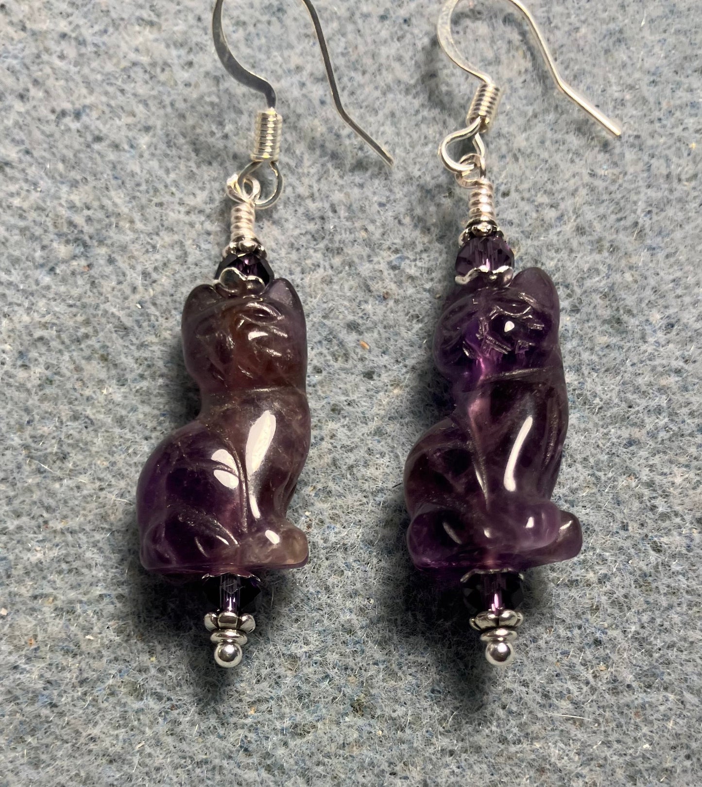 Genuine amethyst gemstone cat bead earrings adorned with purple Chinese crystal beads.