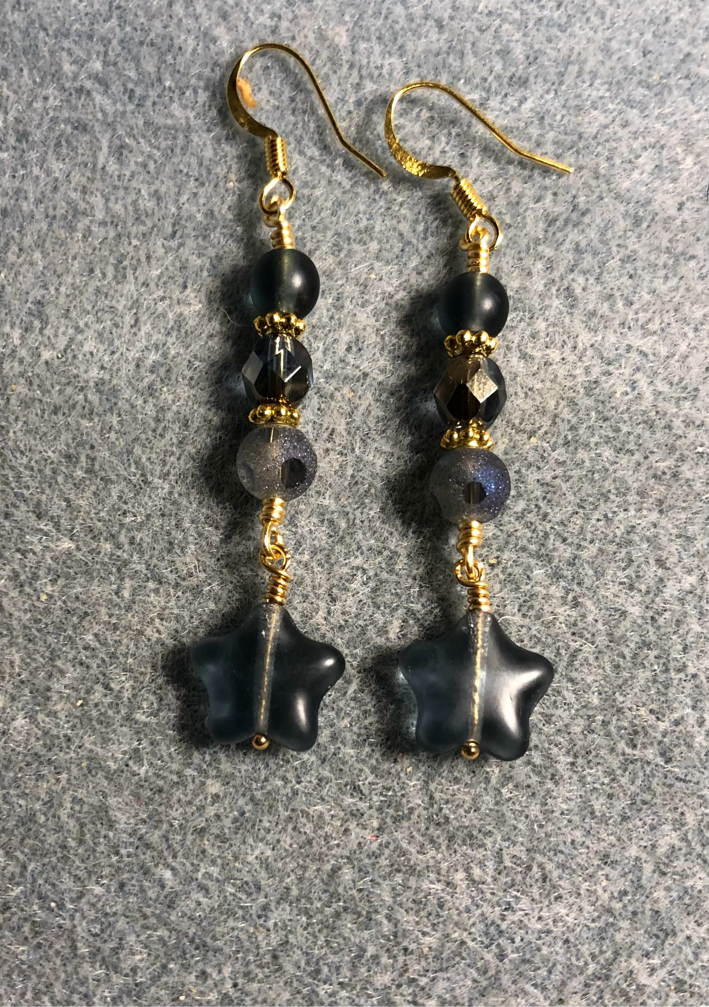 Small Montana blue Czech glass star bead earrings adorned with Montana blue Czech glass beads.