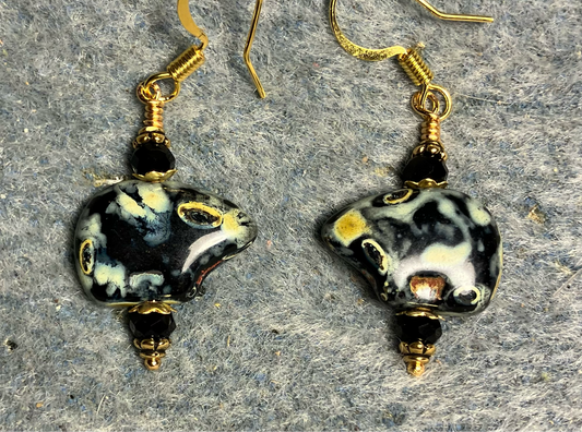 Black Picasso Czech glass bear bead earrings adorned with black Chinese crystal beads.
