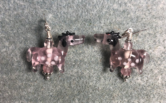 Translucent violet lamp work spotted horse bead earrings adorned with violet Czech glass beads.
