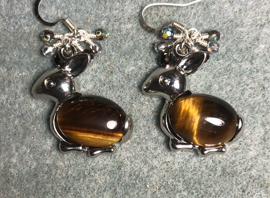Large silver and brown tigereye gemstone rabbit charm earrings adorned with small dangling brown and silver Czech glass beads.