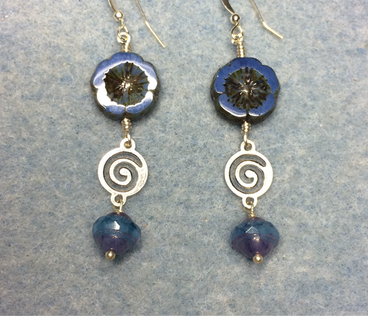 Opaque cornflower blue Czech glass pansy bead earrings adorned with silver swirly connectors and cornflower blue Czech glass Saturn beads.