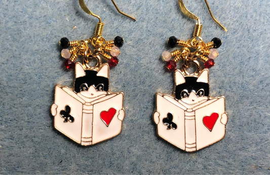 Black, white, and red enamel cats charm earrings adorned with tiny dangling black, red, and white Chinese crystal beads.