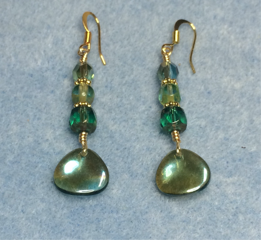 Iridescent blue green Czech glass rose petal earrings adorned with blue green Czech glass beads.