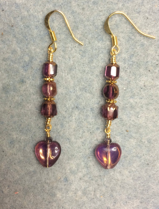 Small violet Czech glass heart bead earrings adorned with violet Czech glass beads.