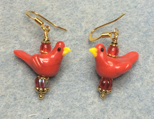 Opaque red lamp work songbird bead earrings adorned with red Czech glass beads.