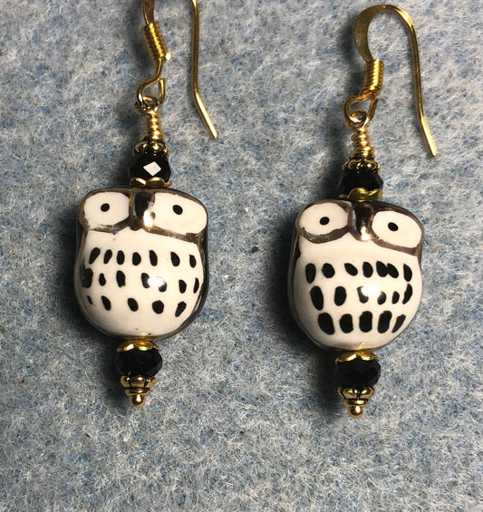 Black ceramic spotted owl bead earrings adorned with black Chinese crystal beads.