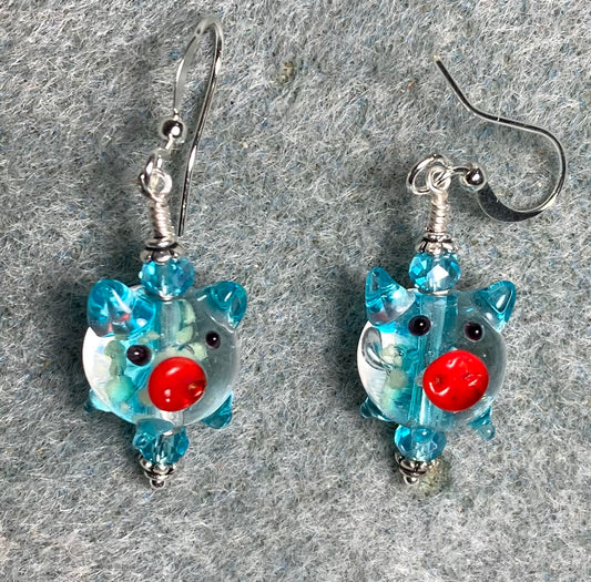 Turquoise, red, and clear glow in the dark lamp work pig bead earrings adorned with turquoise Chinese crystal beads.