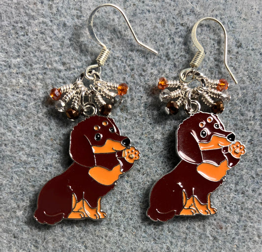 Large brown and orange enamel dachshund charm earrings adorned with tiny dangling brown, orange, and silver Chinese crystal beads.