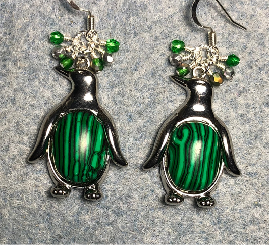 Large silver and malachite gemstone penguin charm earrings adorned with small dangling green and silver Czech glass beads.