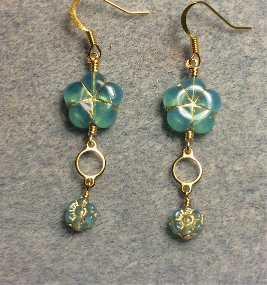 Milky aqua Czech glass puffy flower bead earrings adorned with gold circle connectors and small milky aqua Czech glass daisy beads.