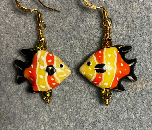Orange, olive green, and black ceramic angelfish bead earrings adorned with sparkly olive green Chinese crystal beads.