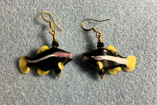 Black and yellow lamp work striped fish bead earrings adorned with black Chinese crystal beads.