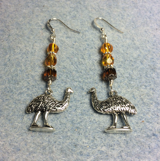 Silver emu charm earrings adorned with amber Czech glass beads
