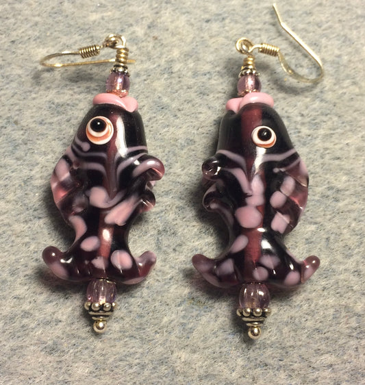 Lavender and pink lamp work fish bead earrings adorned with lavender Czech glass beads.
