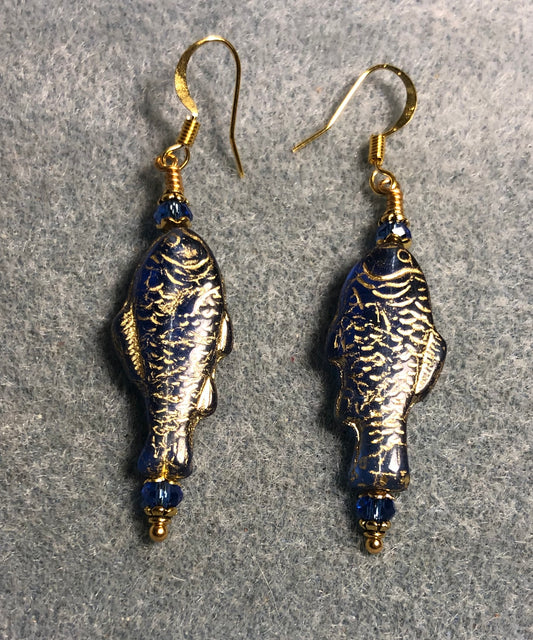 Dark blue (with gold inlay) Czech glass fish bead earrings adorned with dark blue Chinese crystal beads.