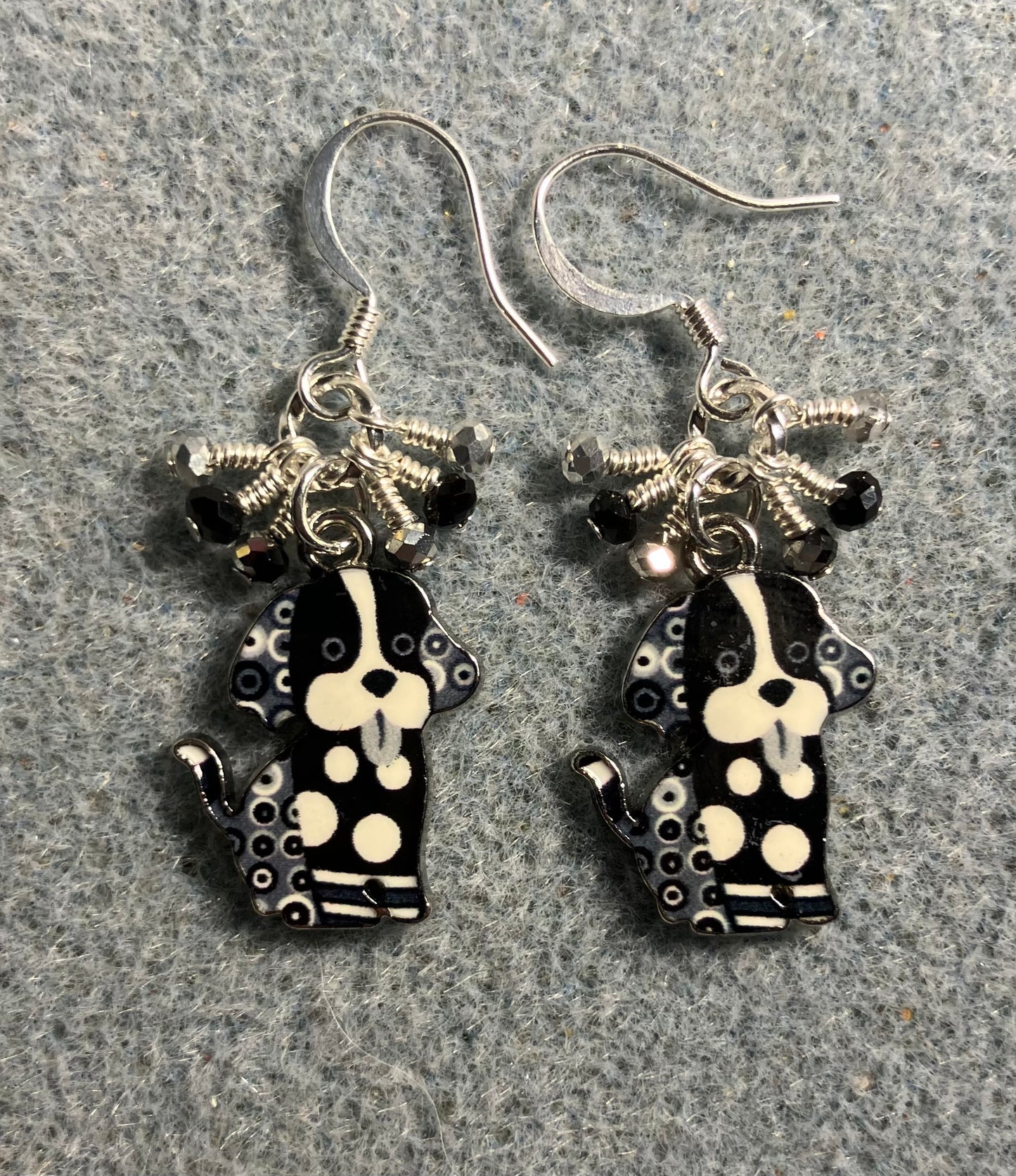 Black and white enamel silly dog charm earrings adorned with tiny dangling hot pink and black and silver Chinese crystal beads.