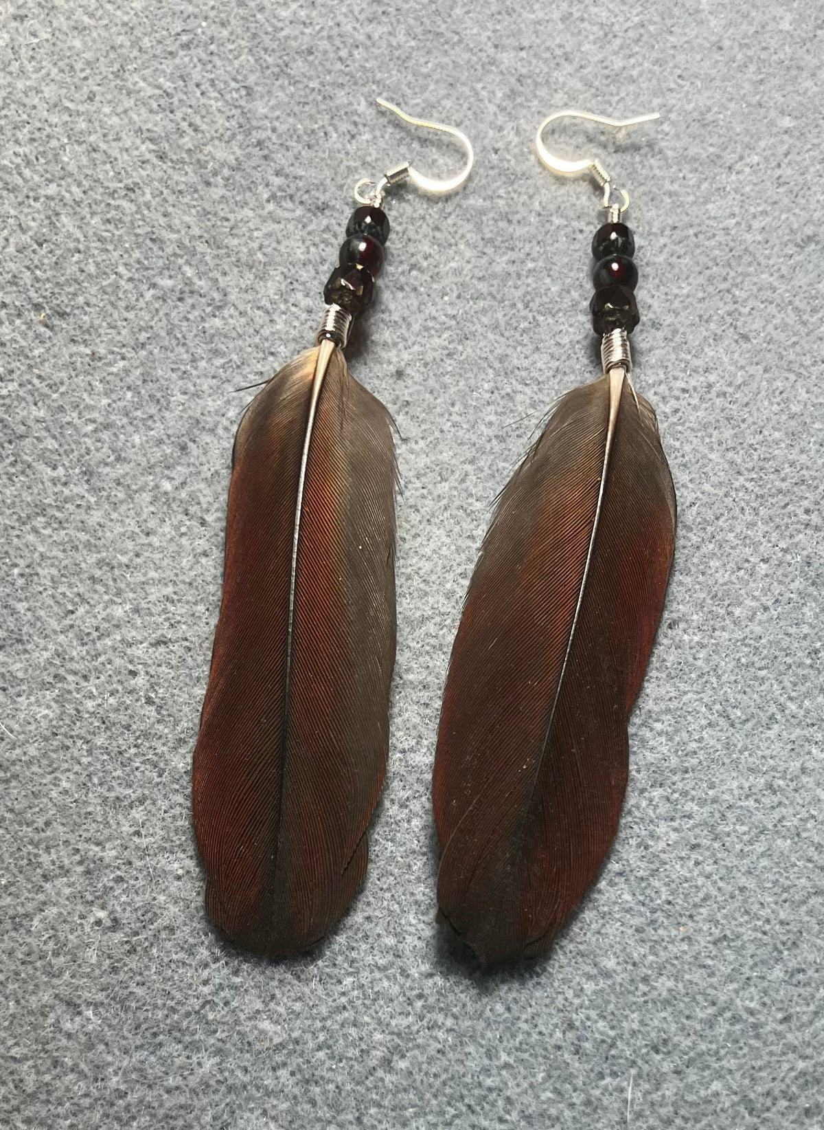 RESERVED FOR BETH: Three pairs of feather earrings: a long gray pair of African gray wing feather earrings, a dark red pair of African gray tail feather earrings, and a dark gray pair of small African gray body feather earrings