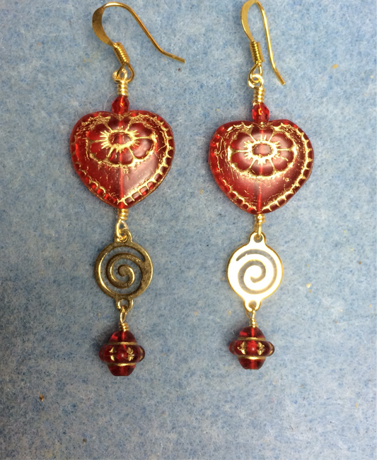 Red (with gold inlay) Czech glass heart bead earrings adorned with gold swirly links and red Czech glass Saturn beads.