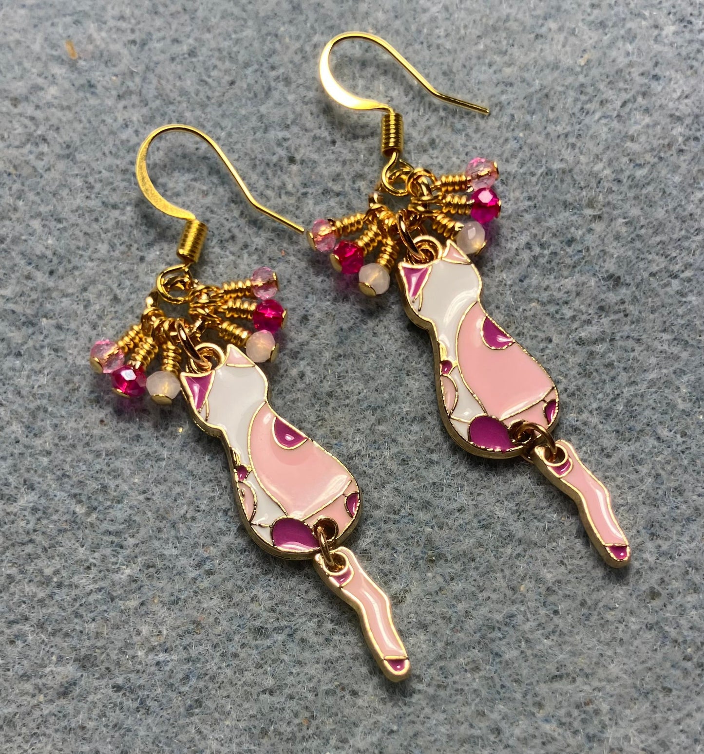 Hot pink, light pink, and white enamel cat charm earrings adorned with tiny dangling hot pink, light pink, and white Chinese crystal beads.